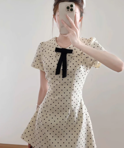 Váy ngắn tay cổ sen đính nơ họa tiết chấm bi chiết eo dáng xòe